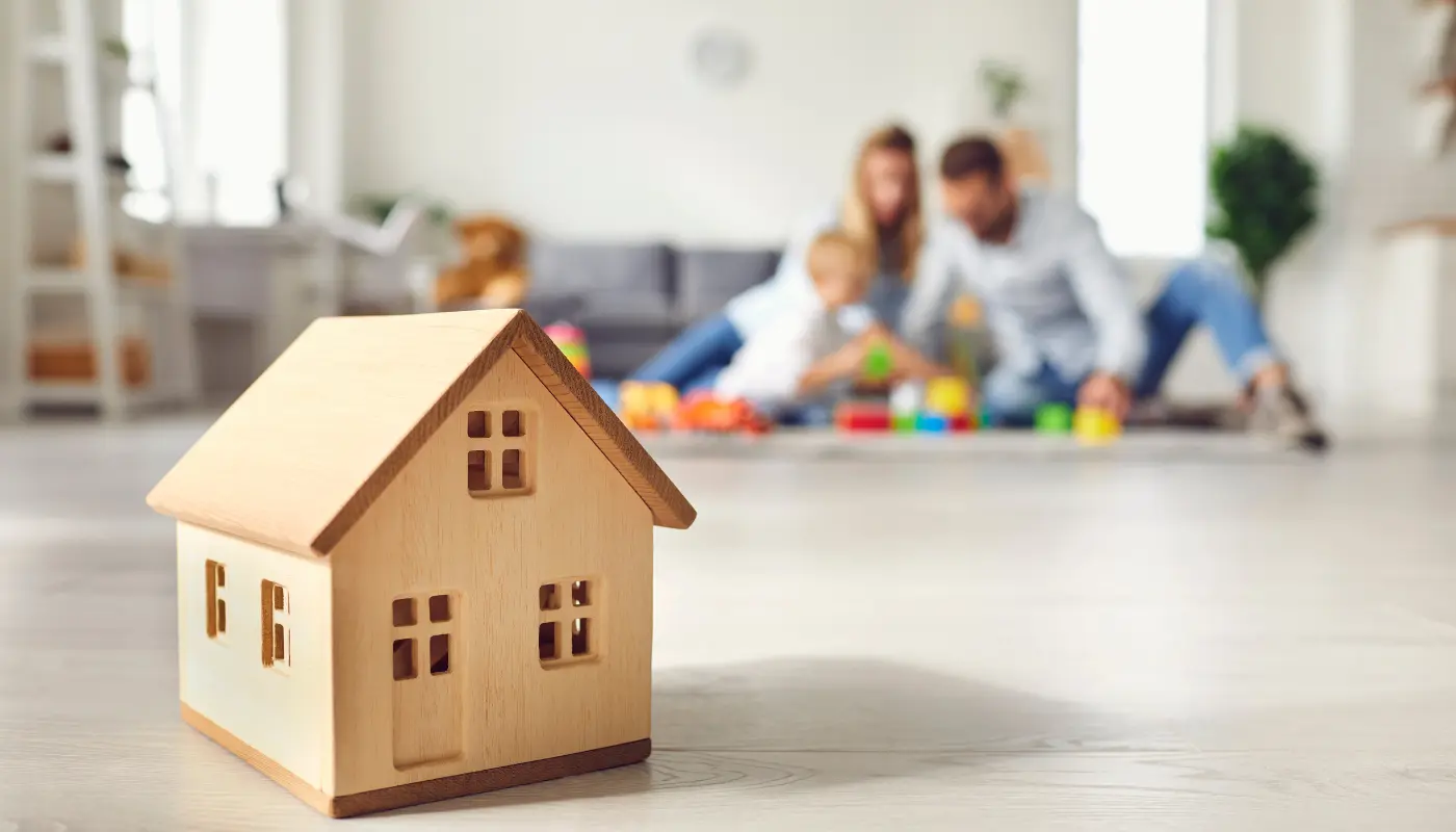 Family achieving homeownership through a 100% down payment assistance program with Crestico home loans.
